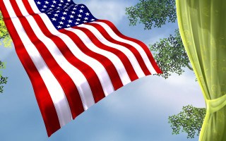 American flag flying sky forest - a large american flag free wallpaper