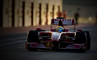 Man racecar street fence building - a man driving free wallpaper