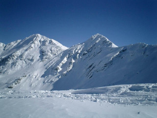 Skier mountains blue sky snowy - ski free wallpaper for desktop