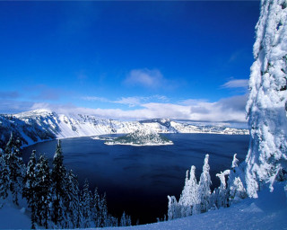 Snowy lake mountains blue sky - a view of a lake free wallpaper