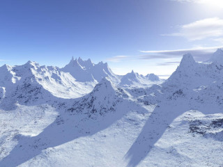 Snowy mountain range bright sun - mountain range free wallpaper