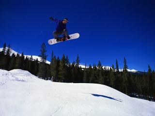 Man flying snowboard slope forest 3 - a snowboard free wallpaper