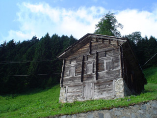 Wooden building hillside forest stone - a wooden building free wallpaper for desktop