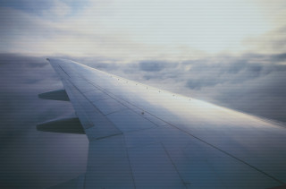 Airplane wing sky clouds sunbeam 2 - cloud below free wallpaper for desktop