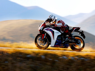 Motorcycle ride mountains grass sunny - a person riding free wallpaper