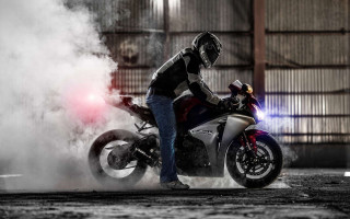Man motorcycle street building smoke - the back free wallpaper