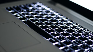 Keyboard closeup laptop blurry background 2 - a close up of a keyboard free wallpaper