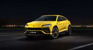 Yellow lamb urus parking lot - a black sky free wallpaper