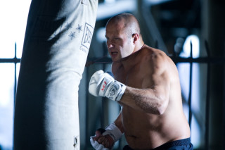 Man boxing shirtless punching bag - dimitre manassiev mehandjiysky free wallpaper