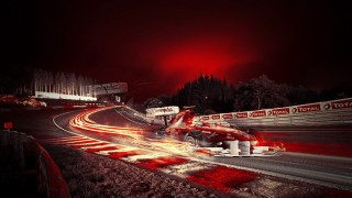 Car driving track red lights - a red sky in the background free wallpaper