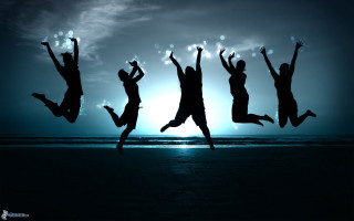 Beach night jumping group sunshine - andries stock free wallpaper