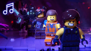 Lego movie scene group people - the wall behind them free wallpaper