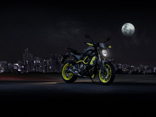Motorcycle parked city night moon - a motorcycle free wallpaper