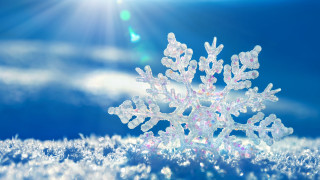 Snowflake blue sky clouds sunshine - a snowflake free wallpaper