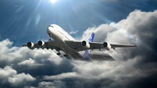 Jetliner flying cloudy sky sunbeams - matte painting free wallpaper
