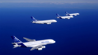 Four airplanes flying blue sky - a group free wallpaper