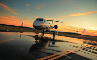Small plane wet runway sunset 2 - luxury free wallpaper