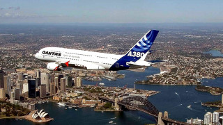 Jetliner city river bridge sky - a large jetliner free wallpaper