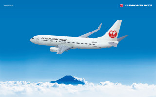 Japan airlines plane clouds mountain - japan free wallpaper