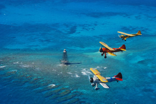 Three planes blue ocean corals - alson s. clark free wallpaper for desktop