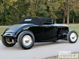 Black car parked street forest - a forest of trees and grass free wallpaper