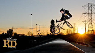 Man riding bike ramp sunset - ben thompson free wallpaper