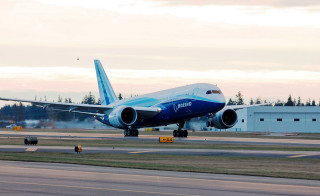 Jetliner airport runway building trees - a building and trees free wallpaper