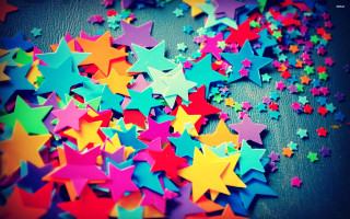 Colorful stars tabletop black background 7 - a pile free wallpaper for desktop