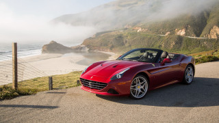 Red sports car ocean cliff - a red sports car free wallpaper